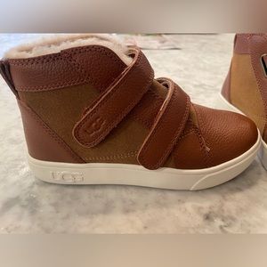 Ugg boys Velcro boots.  Brand new with tags.  Brown; size 1